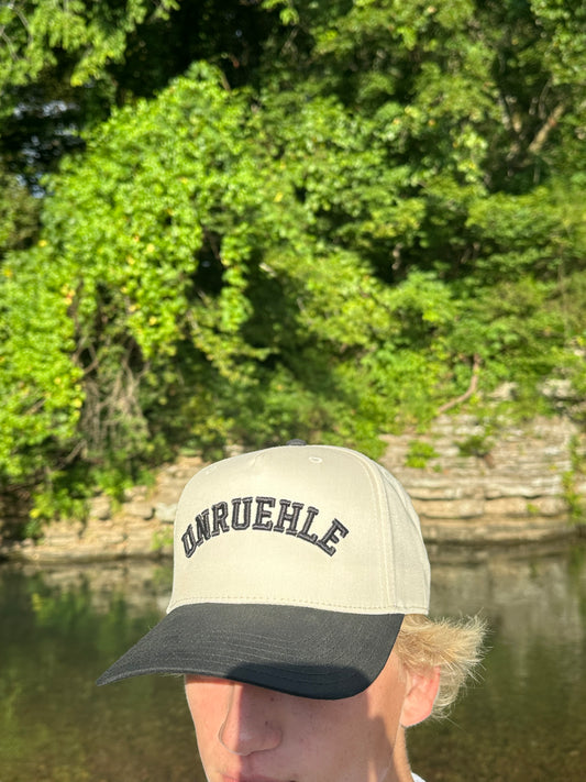 UNRUEHLE Black and Beige Hat